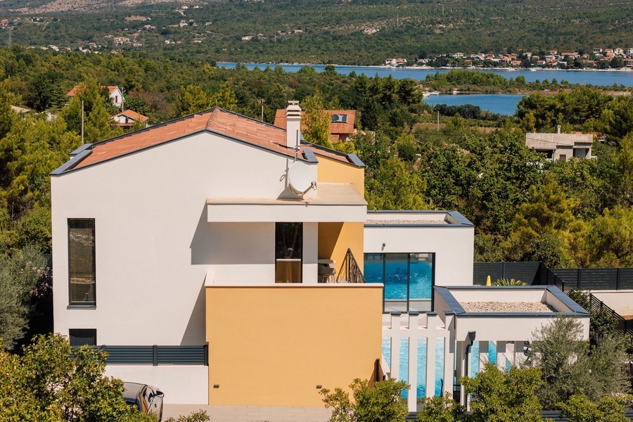 Rear of the villa with a view of the sea