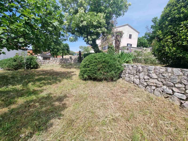 Semi-detached house with a Mediterranean garden for sale in Novi, Croatia.