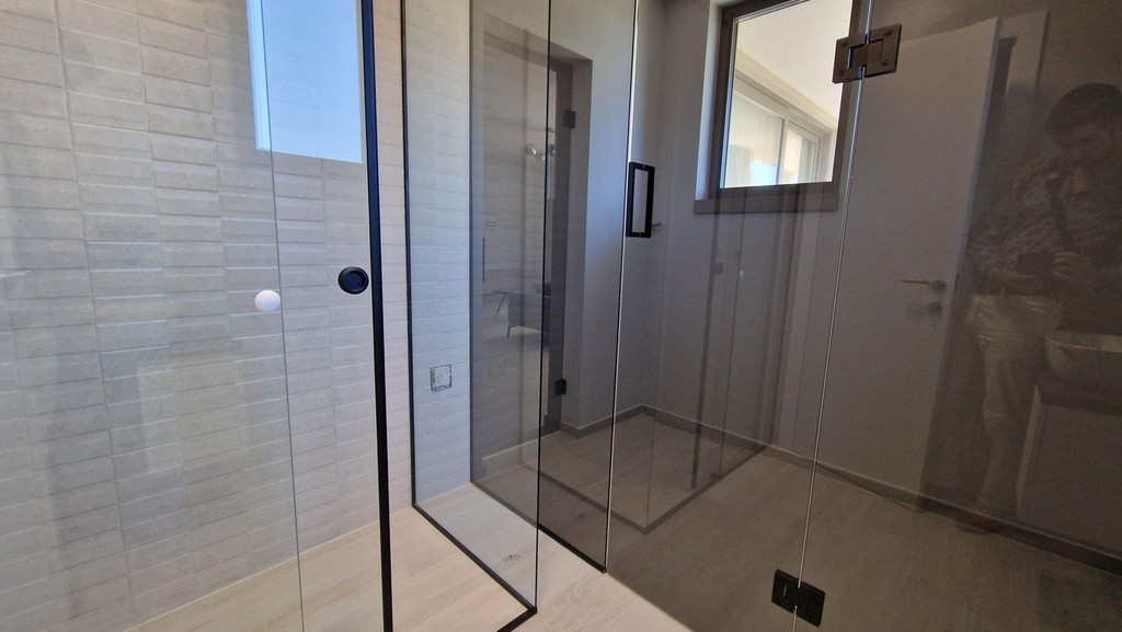 Shower with glass wall