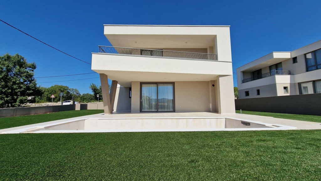 Garden side of the villa with lawn area