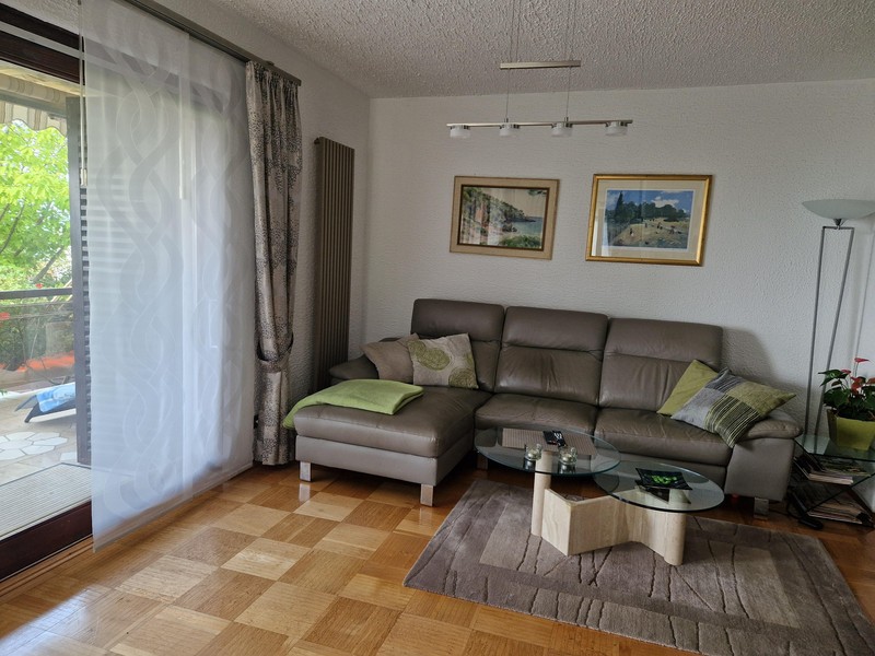 Living room with sofa and balcony door