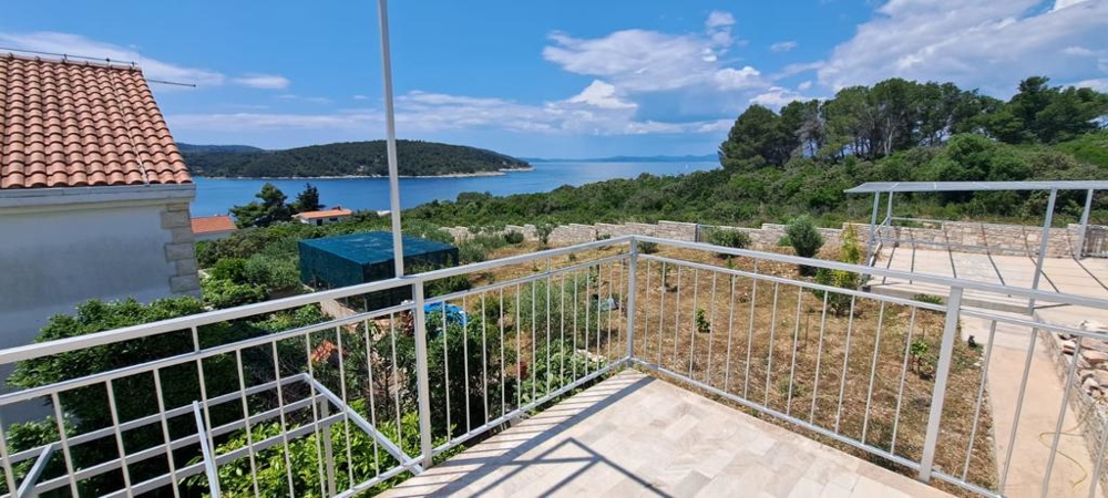 House with a beautiful sea view from the terrace - for sale on the island of Solta, Croatia.