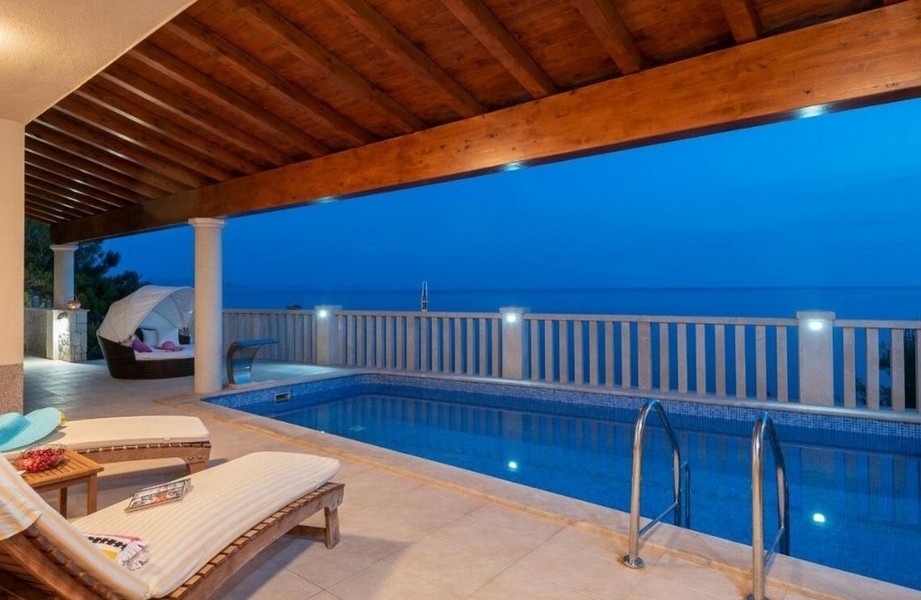 Covered pool with wooden ceiling in luxury villa on Korcula