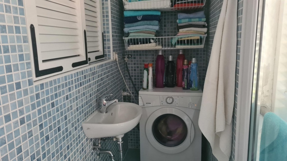 Bathroom with washing machine connection