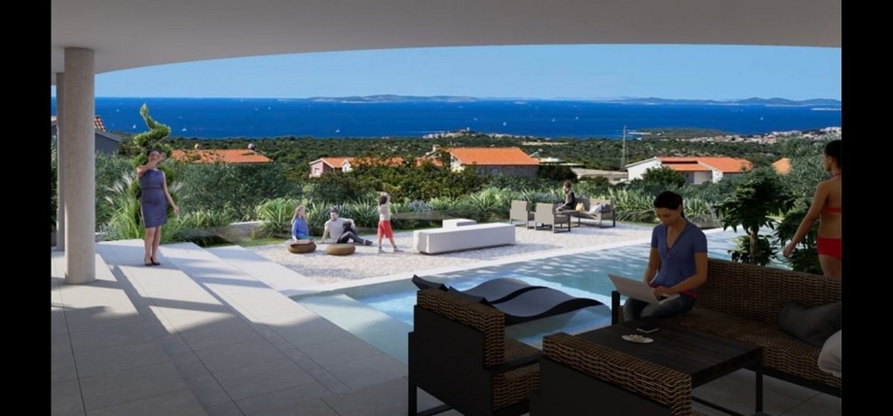 View from a covered terrace of a luxurious Croatian villa with guests enjoying the sea view – Buy a villa in Croatia.