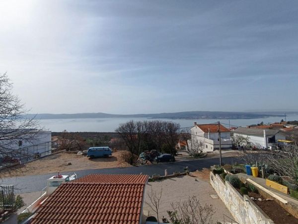 Views of the sea and surrounding countryside from an apartment building for sale in Crikvenica, Croatia