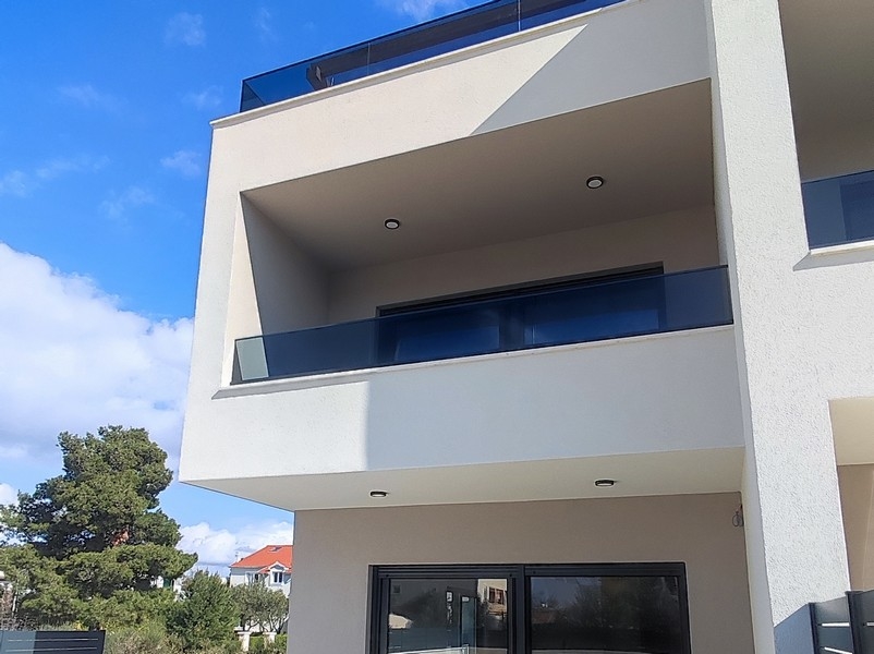 Architectural detail shot of a modern semi-detached house in Croatia with a characteristic balcony