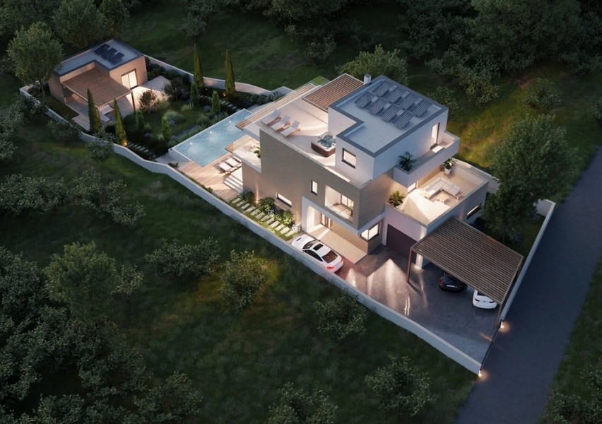 Aerial view of a modern property in Croatia, villa with sea view at night