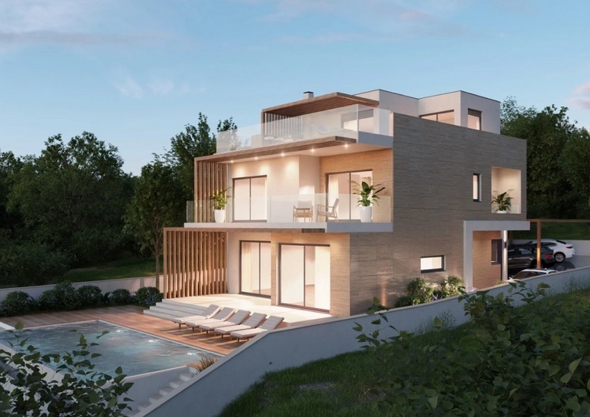 Aerial view of a modern property in Croatia, villa with sea view at night