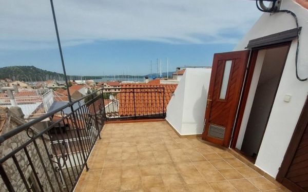 Large roof terrace with sea views and open entrance area, perfect for real estate Croatia