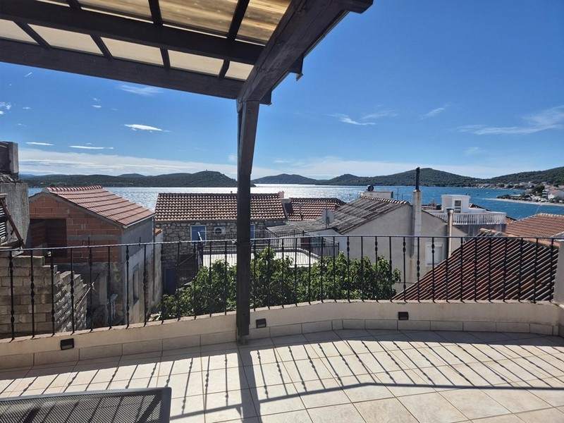 Sea view from stone house H3420, which is for sale in Croatia.