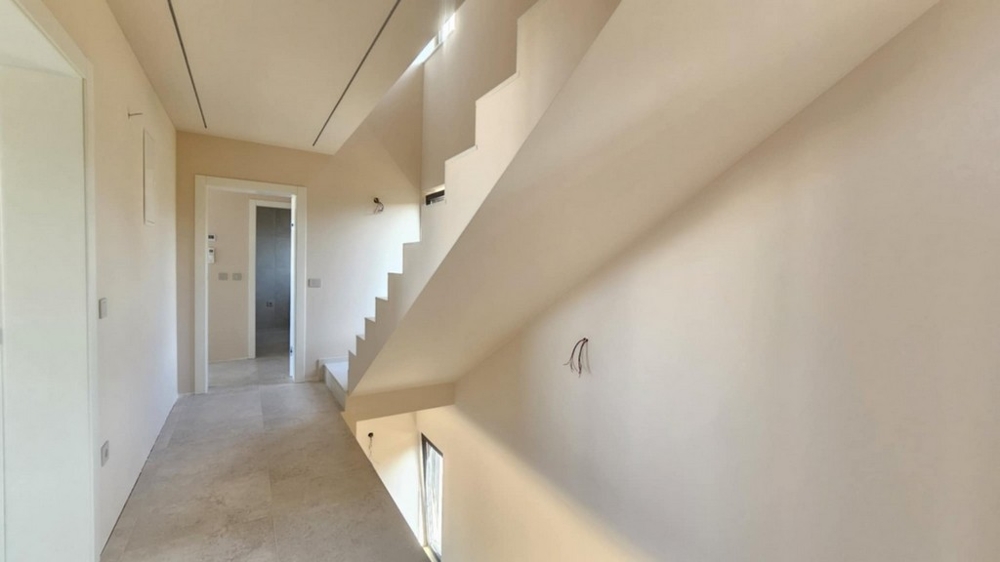 Staircase and hallway on the upper floor of the new-build villa in Istria