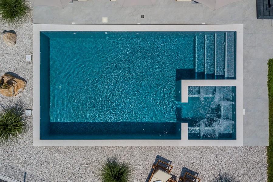 Swimming pool of the luxury villa H3693 that is available at Split in Croatia.