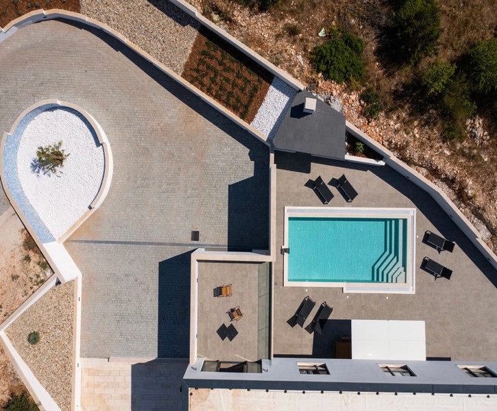 Aerial view of villa with swimming pool and terrace