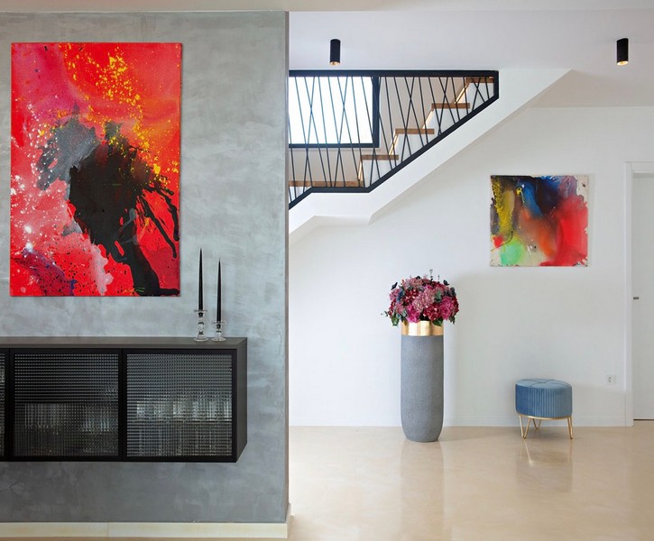 Entrance area with modern art and stairs
