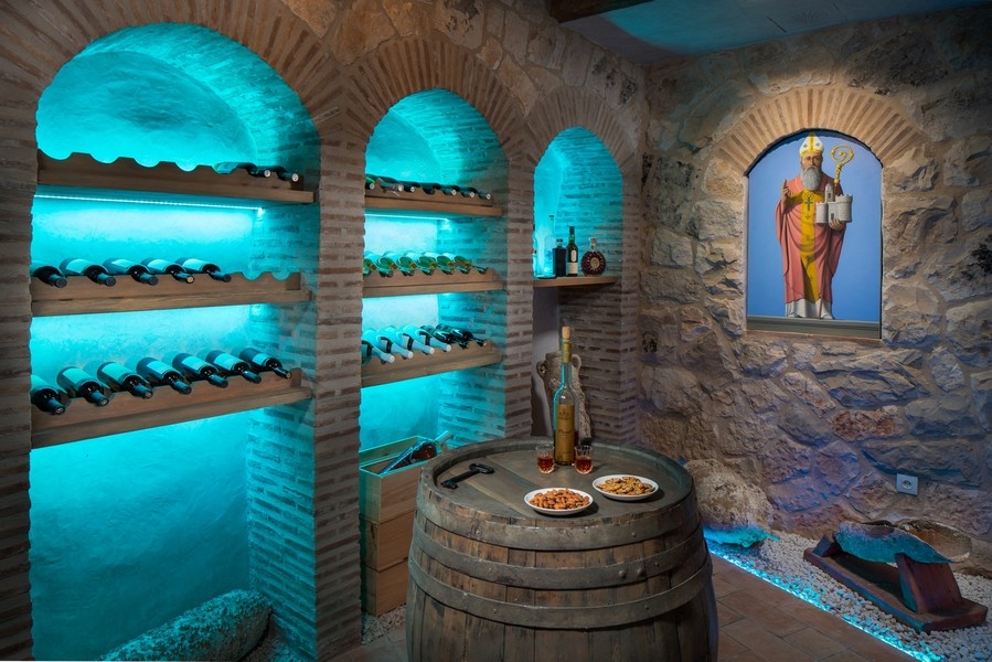 Wine cellar of Villa H3754 - with shelves and barrel