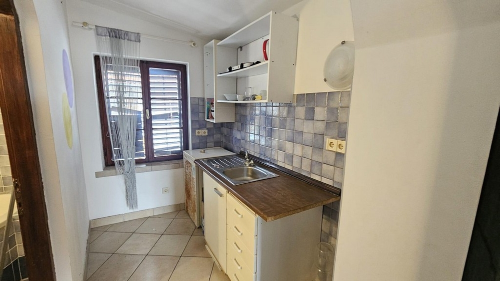 Small kitchenette with shutters