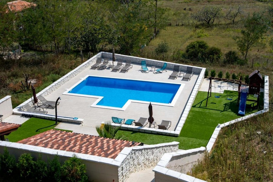 Buy a villa with pool on Rab in Croatia.