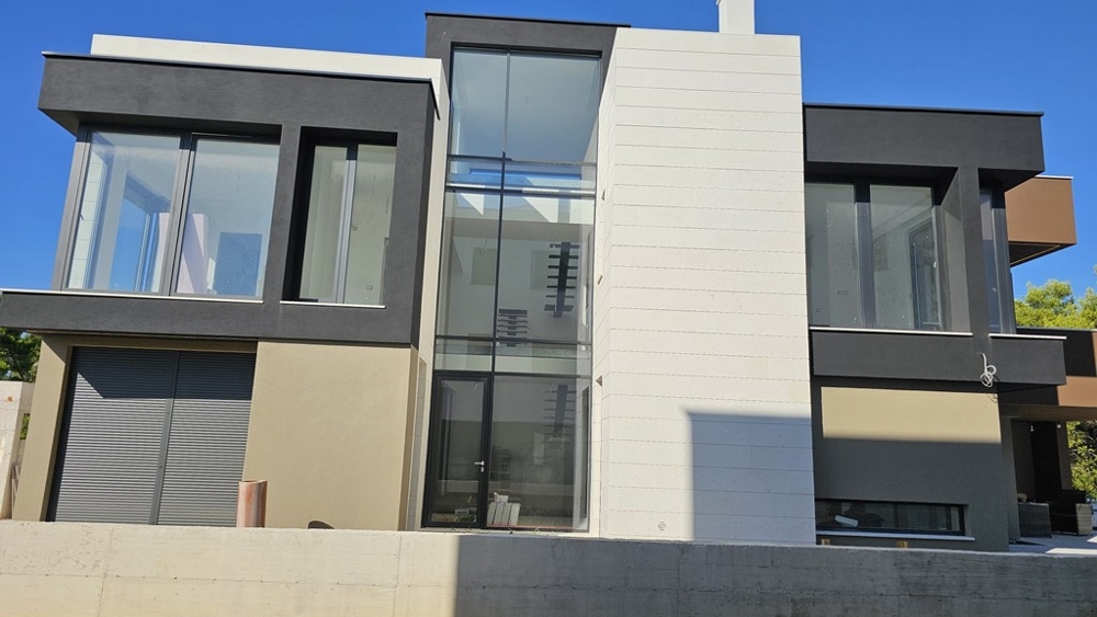 Facade of villa H3778 with glass staircase - Real Estate Croatia.