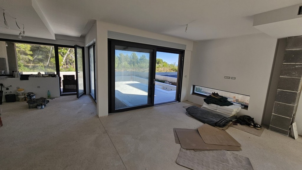 Living area in the shell with glass front to the pool - Villa H3778 in Privlaka.