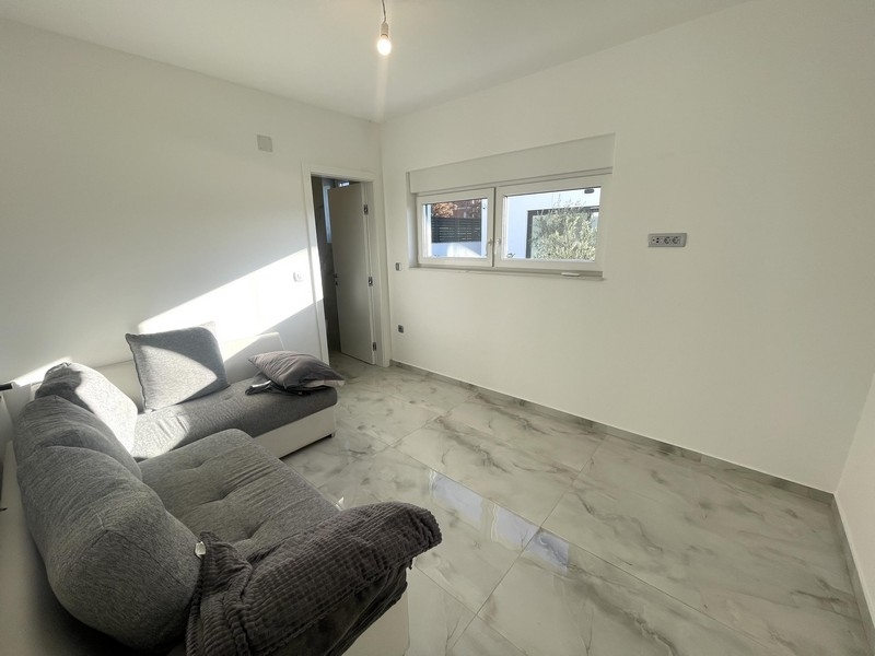 Another bedroom with modern flooring