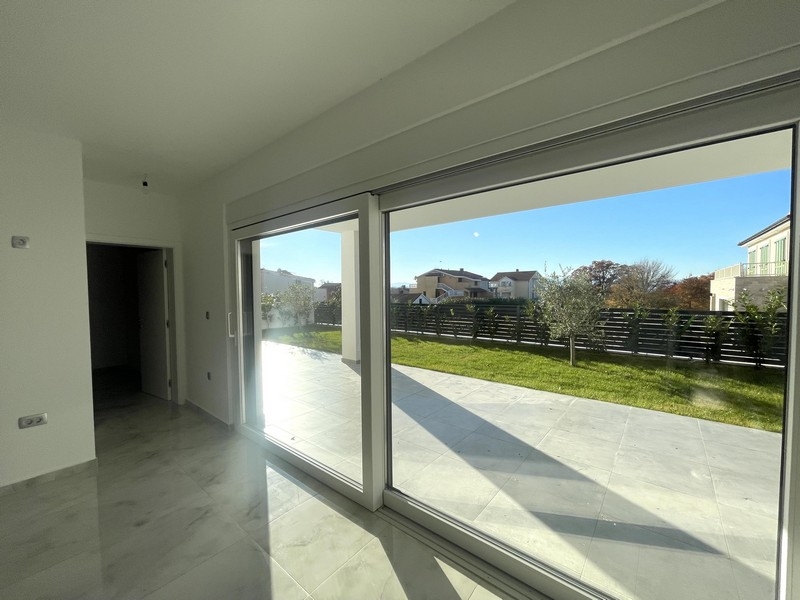 Living room with sliding door to the terrace