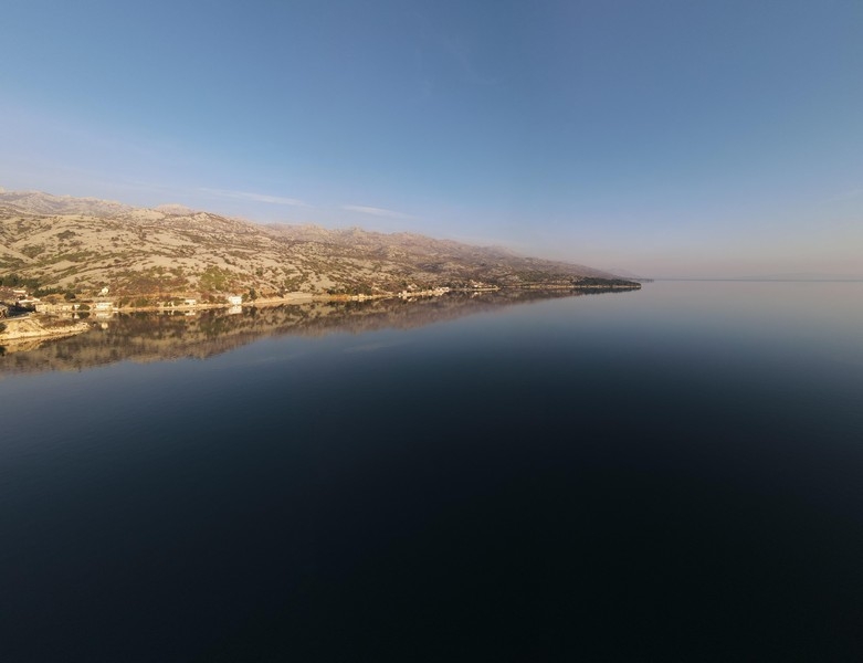 Coastal landscape with calm sea and rocky coast in northern Dalmatia