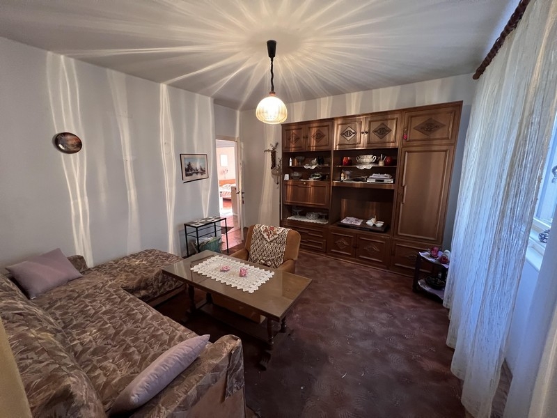 Bedroom with window and seating area