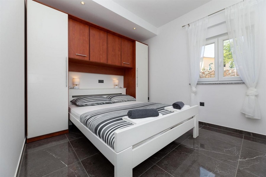 Bedroom with built-in wardrobe