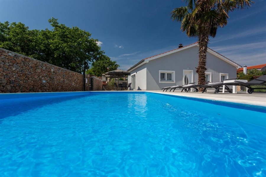 Buy a house with a pool on the island of Krk, Croatia.