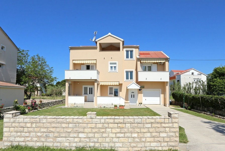Buy a house with apartments in Croatia.