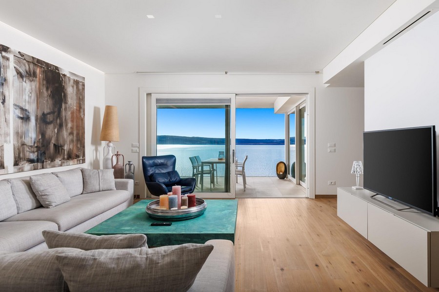 Living area with terrace access and sea views