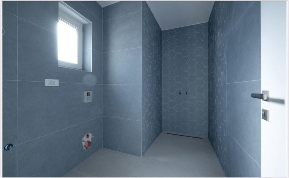 Bathroom with floor-level shower