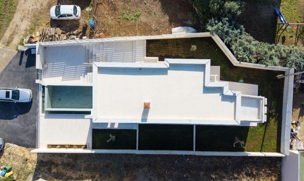 Aerial view of villa with pool and grounds