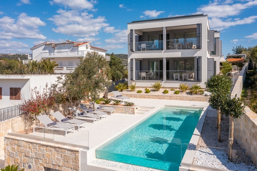 Buy a luxurious villa directly on the beach near Rogoznica, Dalmatia.