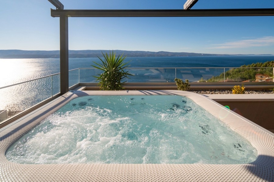 Rooftop hot tub with sea views