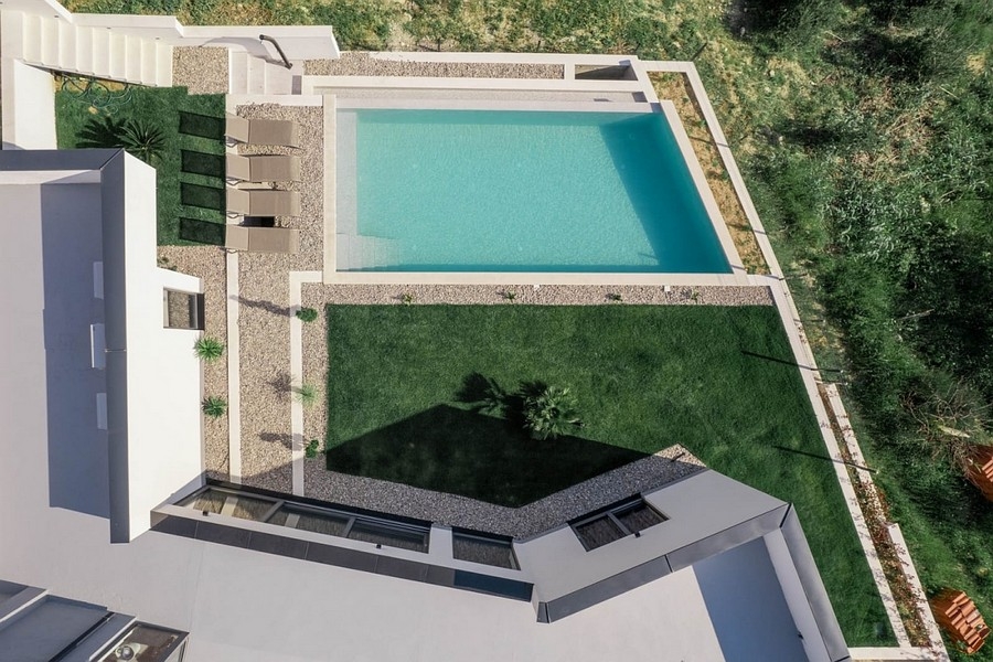 Aerial view of the villa with pool and gardens