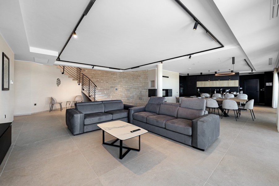 Spacious living and dining area with open kitchen