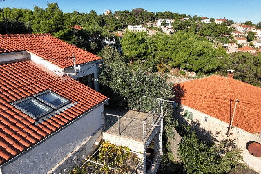Exterior of house with red tiled roof