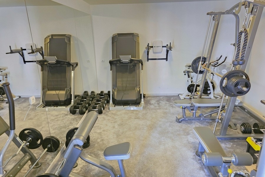 Fitness room with exercise equipment