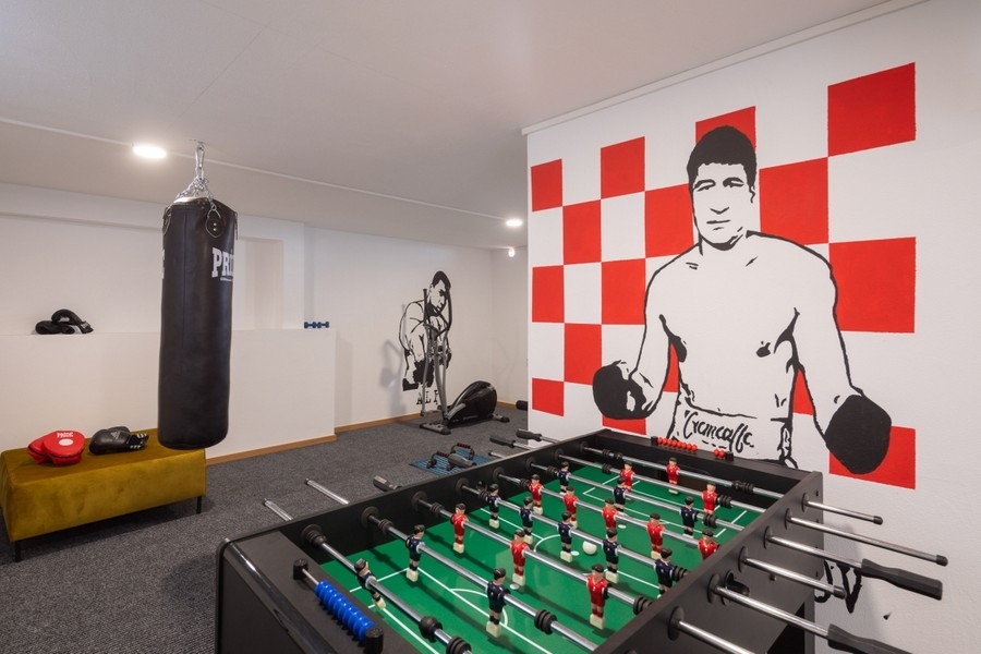 Leisure room with table football and fitness area in the villa