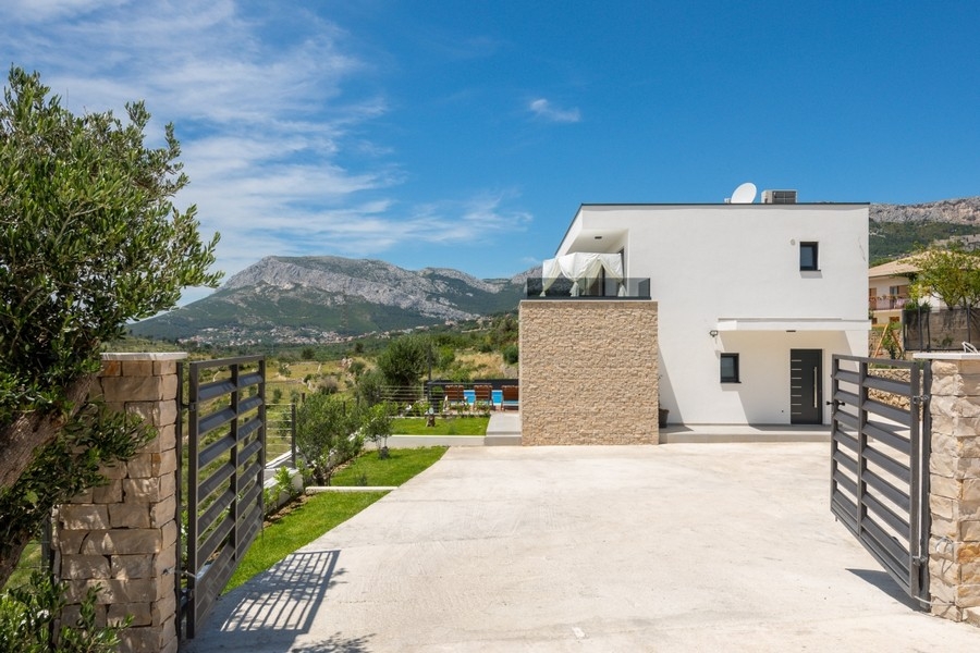 Aerial view of modern villa with pool and garden in Dalmatia