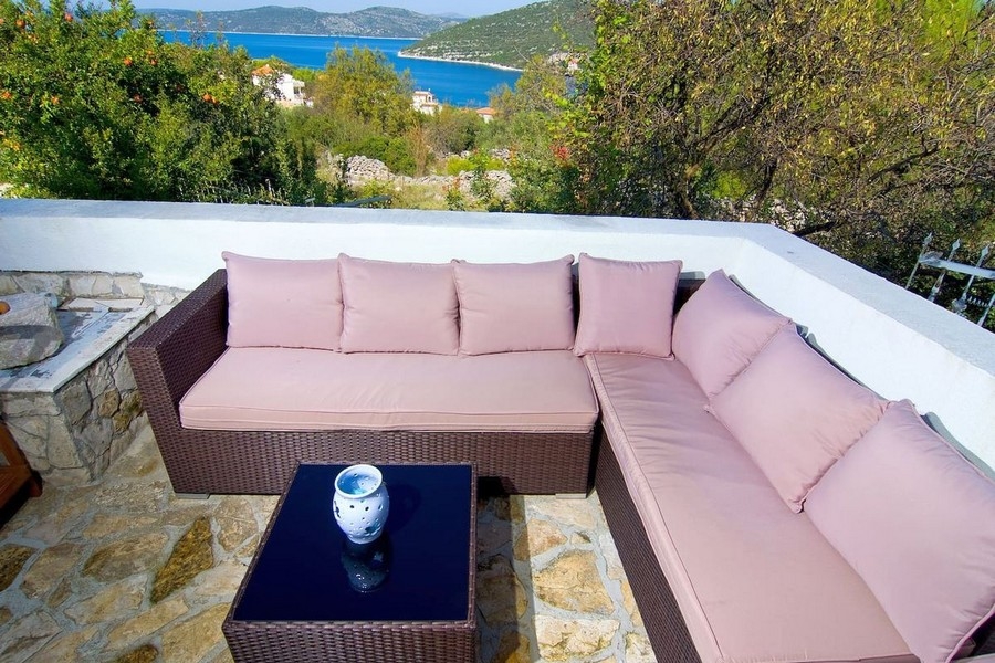 Terrace with seating lounge and sea views