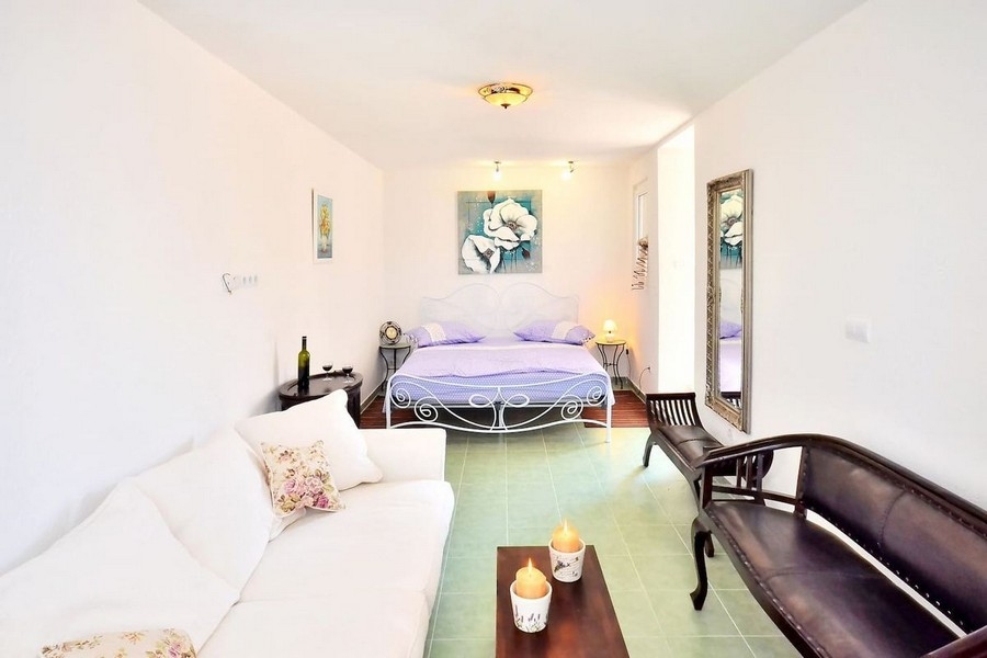 Bedroom with double bed and seating area