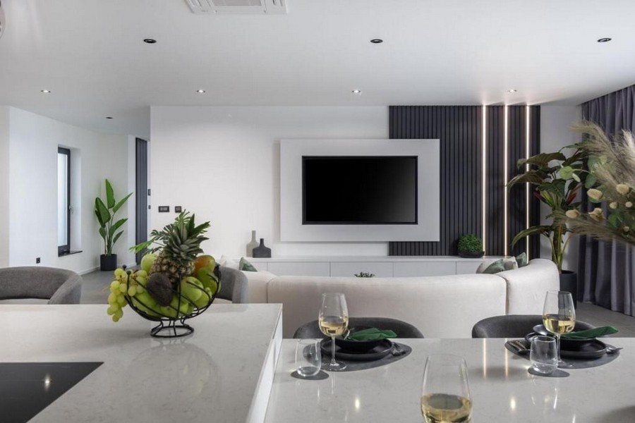 Living room with TV area in modern villa