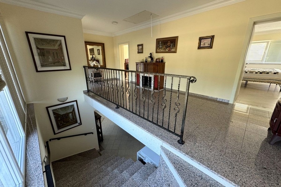 Hall on the upper floor with staircase