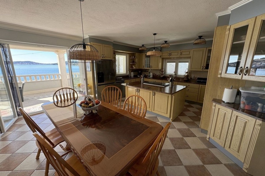 Large kitchen with island and sea views