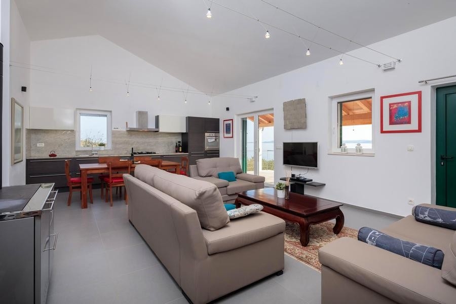 Living room with kitchen and sea view