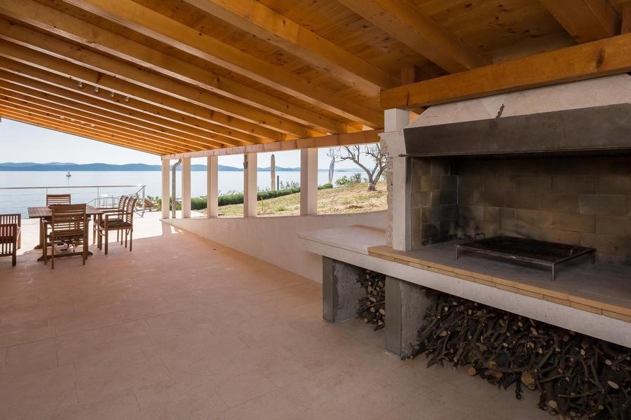 Covered barbecue area with a view of the sea