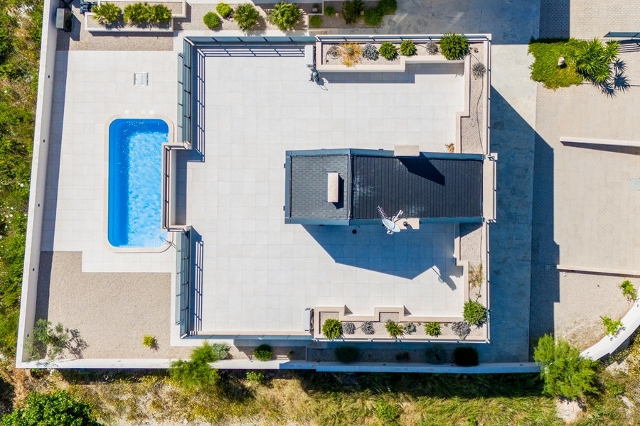 Aerial view of apartment villa with swimming pool and sun terrace on Solta